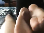 Giving a reverse footjob and taking cumshot