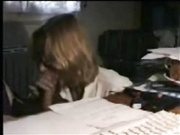 Giving a blowjob at work