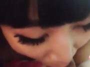 Asian girl blows a small cock
