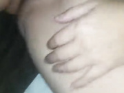 Stimulating clitoris with black vibrator