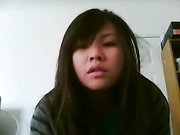 Asian teen masturbating her pink pussy