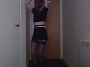 Gorgeous redhead does a sexy striptease