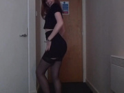 Gorgeous redhead does a sexy striptease