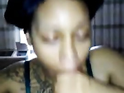 Ebony babe blows a black cock