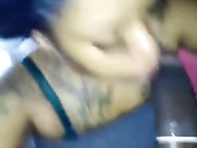 Ebony babe blows a black cock