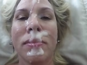 Blonde Milf takes huge facial and spreads the cum